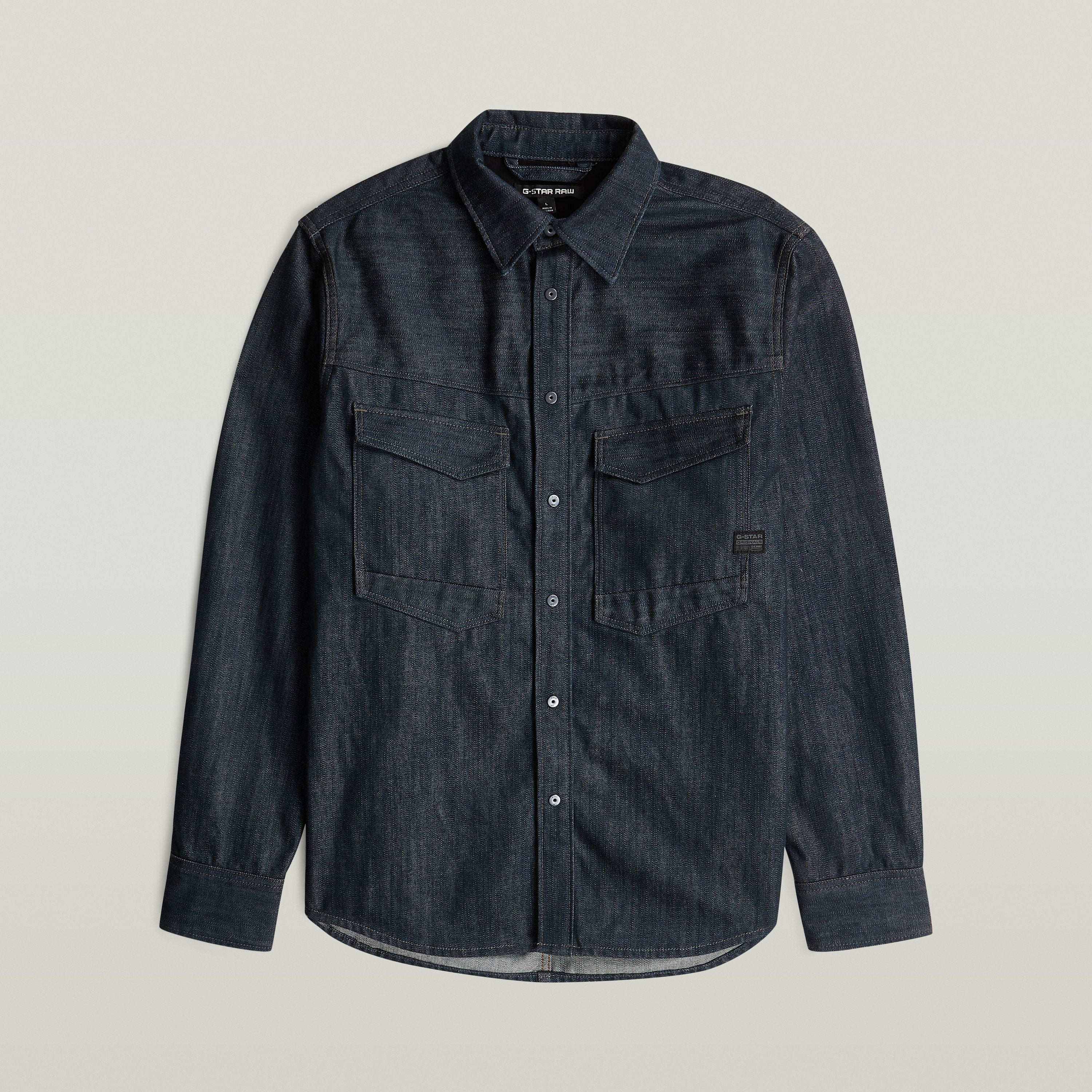 Sobrecamisa regular Dakota en denim greencast, con cuello de camisa clásico y cierre de botones a presión.