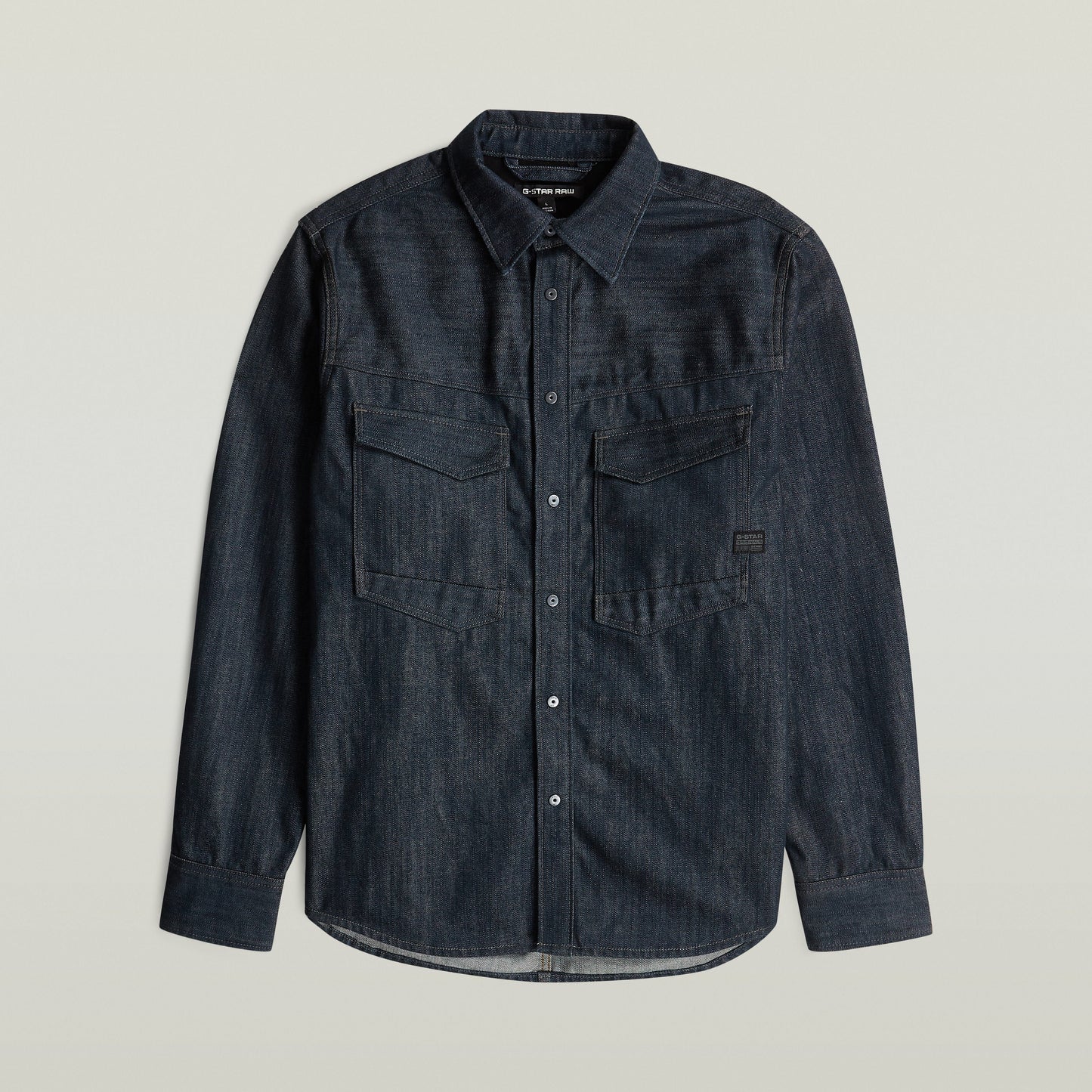 Sobrecamisa regular Dakota en denim greencast, con cuello de camisa clásico y cierre de botones a presión.