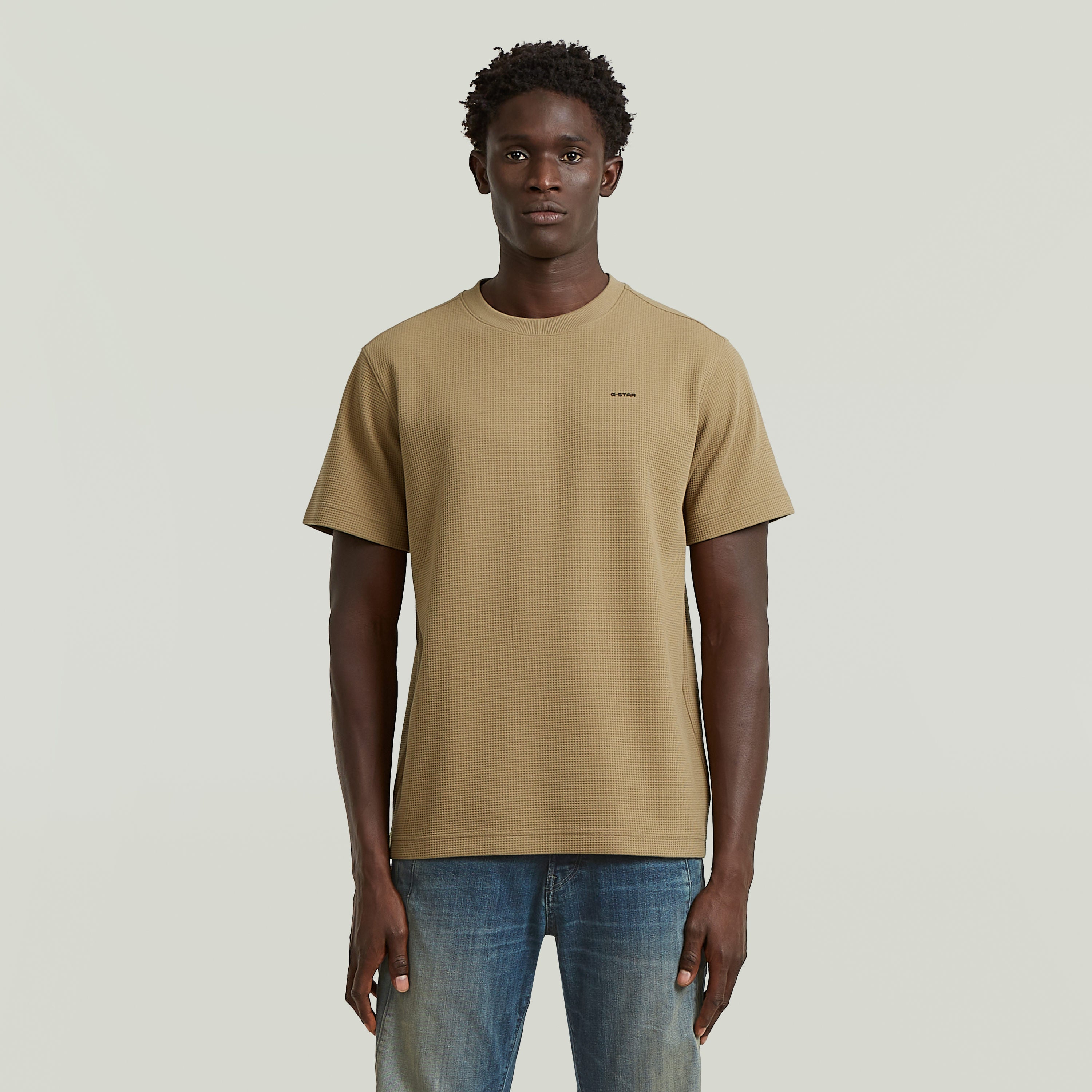Regular fit waffle t-shirt in beige color, featuring short sleeves and a round neck.