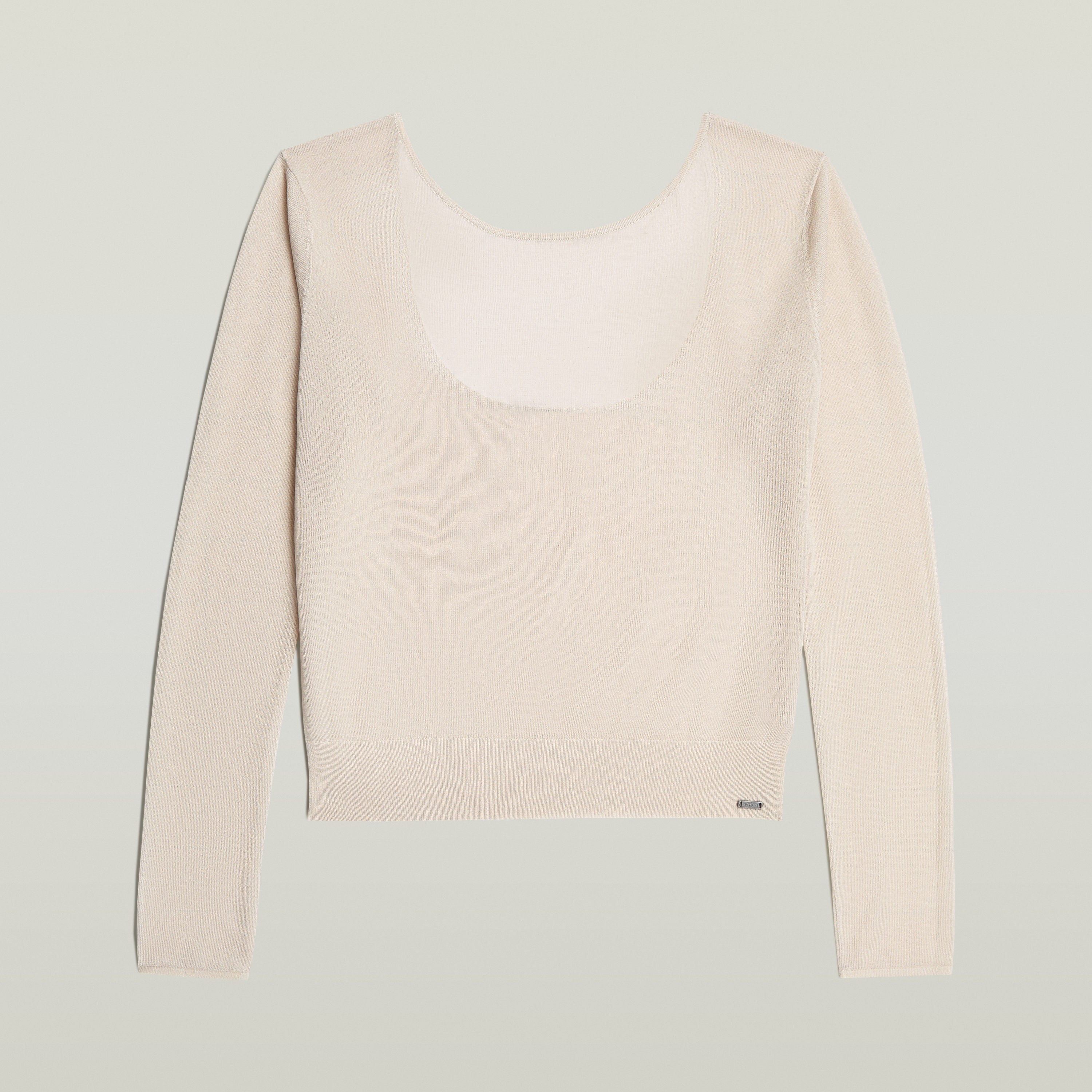 Jersey Sheer Summer El Sheer Summer Knit tiene fit regular, manga larga y un diseño liviano, ideal para usar en capas.