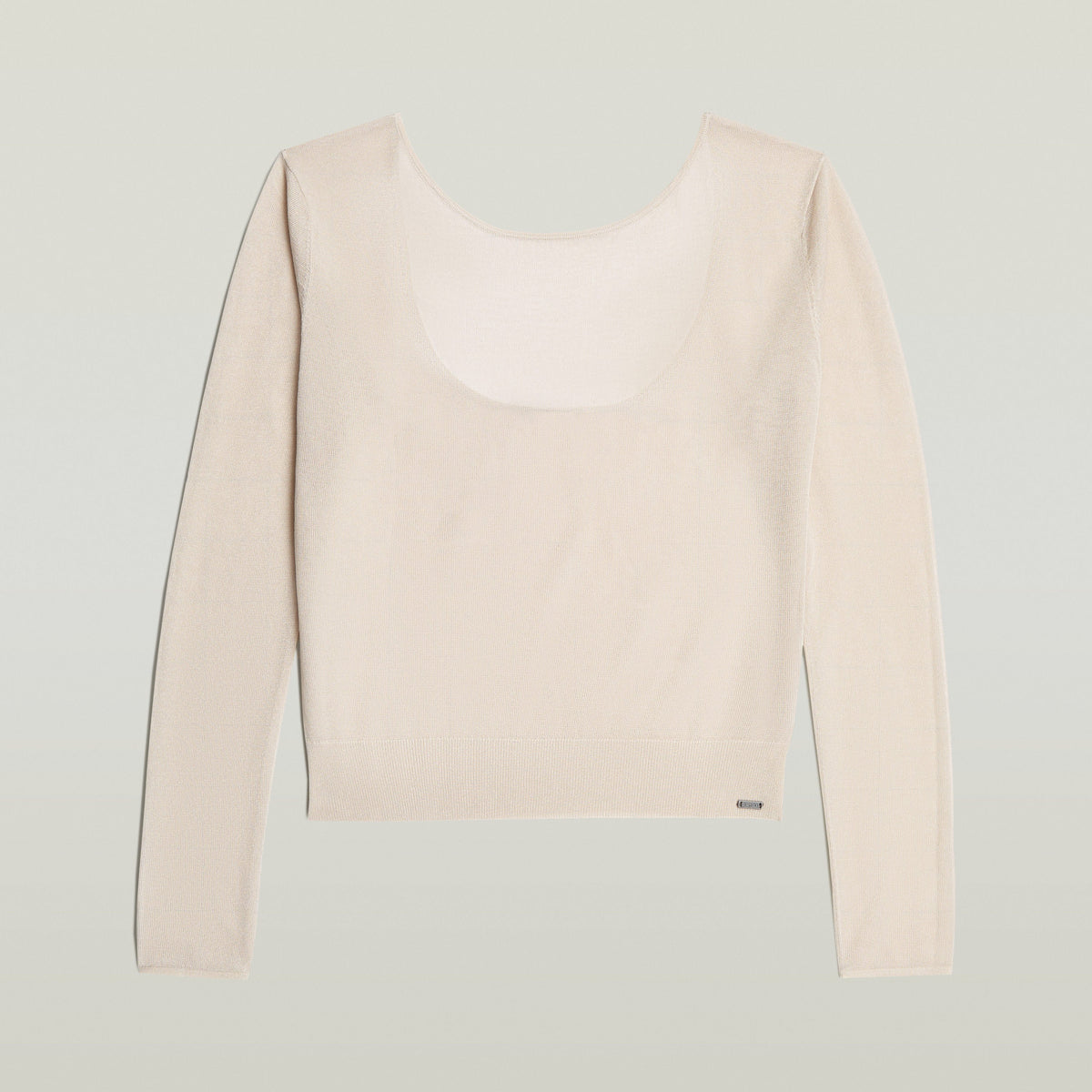 Jersey Sheer Summer El Sheer Summer Knit tiene fit regular, manga larga y un diseño liviano, ideal para usar en capas.