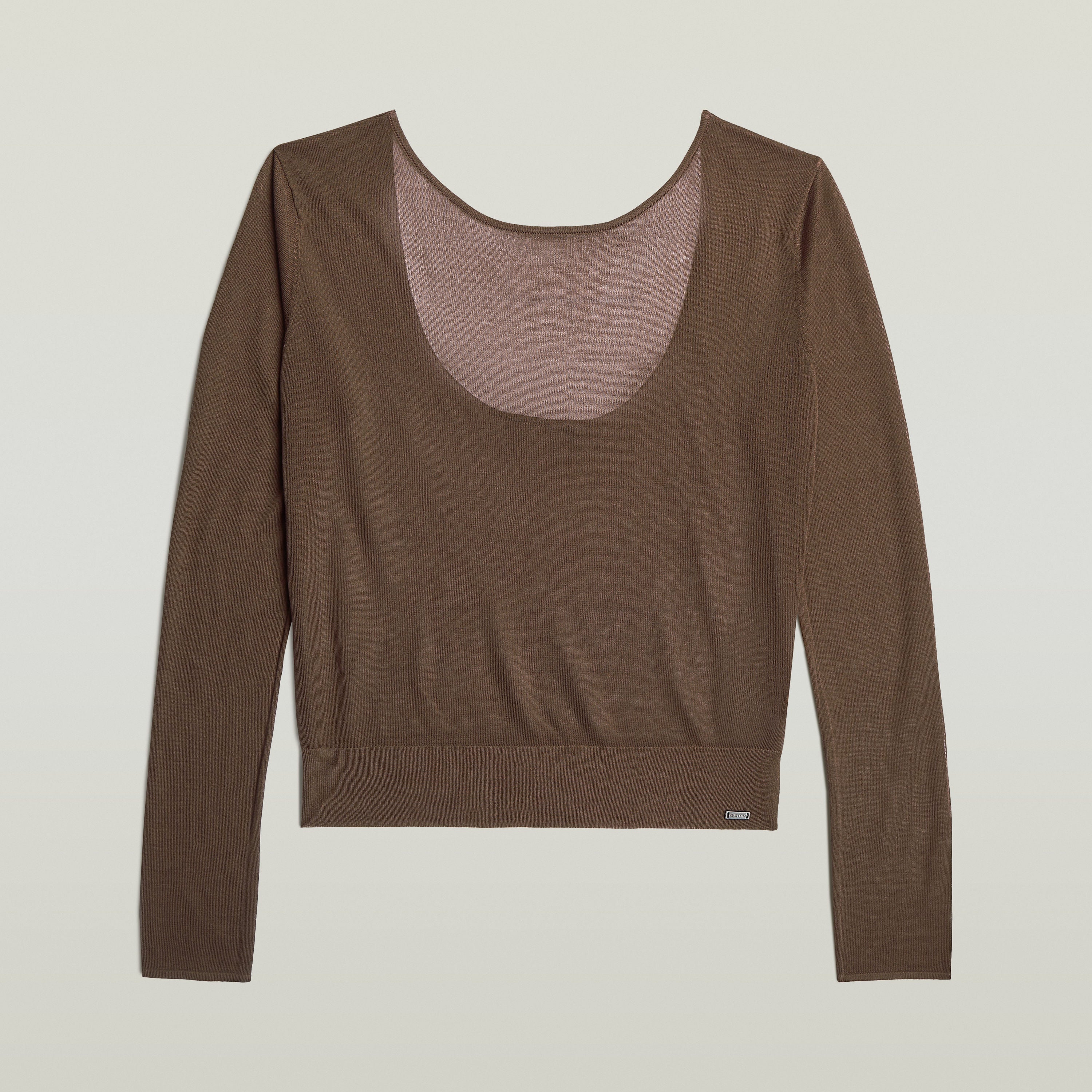 Jersey Sheer Summer El Sheer Summer Knit tiene fit regular, manga larga y un diseño liviano, ideal para usar en capas.