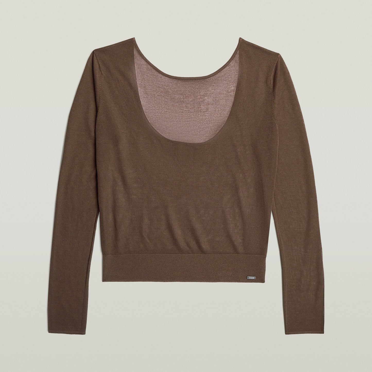 Jersey Sheer Summer El Sheer Summer Knit tiene fit regular, manga larga y un diseño liviano, ideal para usar en capas.