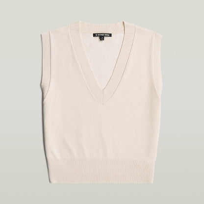 Chaleco de punto holgado, sin mangas, cuello de pico, color blanco, loose knit sleeveless vest.
