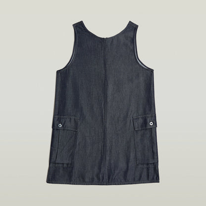 Vestido Cargo Shift ligero en denim oscuro con tirantes anchos y bolsillos laterales.