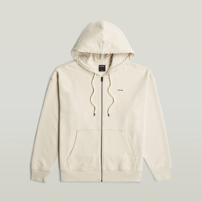 Sudadera Back Graphic Loose con Capucha y Cremallera El Back Graphic Loose Hooded Zip Sweater tiene fit holgado con capucha y cierre de cremallera, para un estilo relajado y casual.