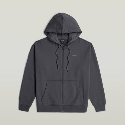 Sudadera Back Graphic Loose con Capucha y Cremallera El Back Graphic Loose Hooded Zip Sweater tiene fit holgado con cierre de cremallera y capucha, para un estilo casual y cómodo.