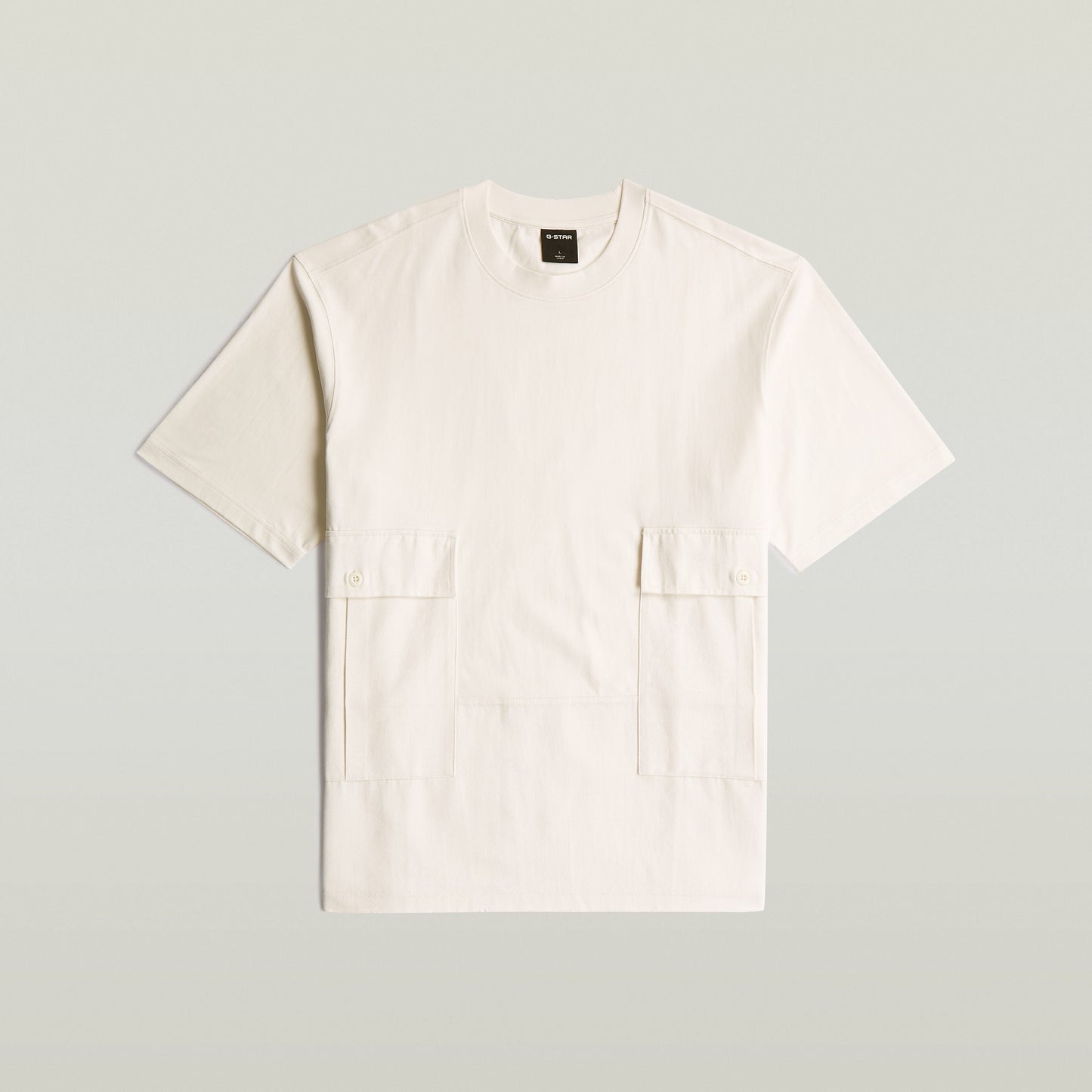 Camiseta Utility Fabric Mix blanca de algodón ecológico con corte suelto y detalles de bolsillos, utility fabric t-shirt.