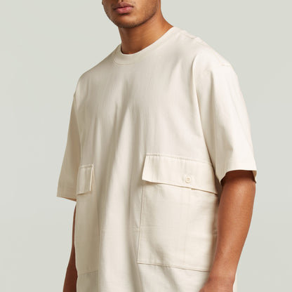 Camiseta Utility Fabric Mix con corte suelto, cuello redondo y bolsillos, color blanco. Ideal utility fabric t-shirt.