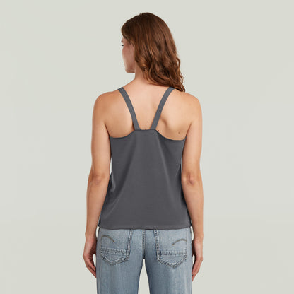 Camiseta Flowy Tape Slim La Flowy Tape Tank T-Shirt tiene fit slim con diseño racerback y escote redondo, para un look sobrio y moderno.