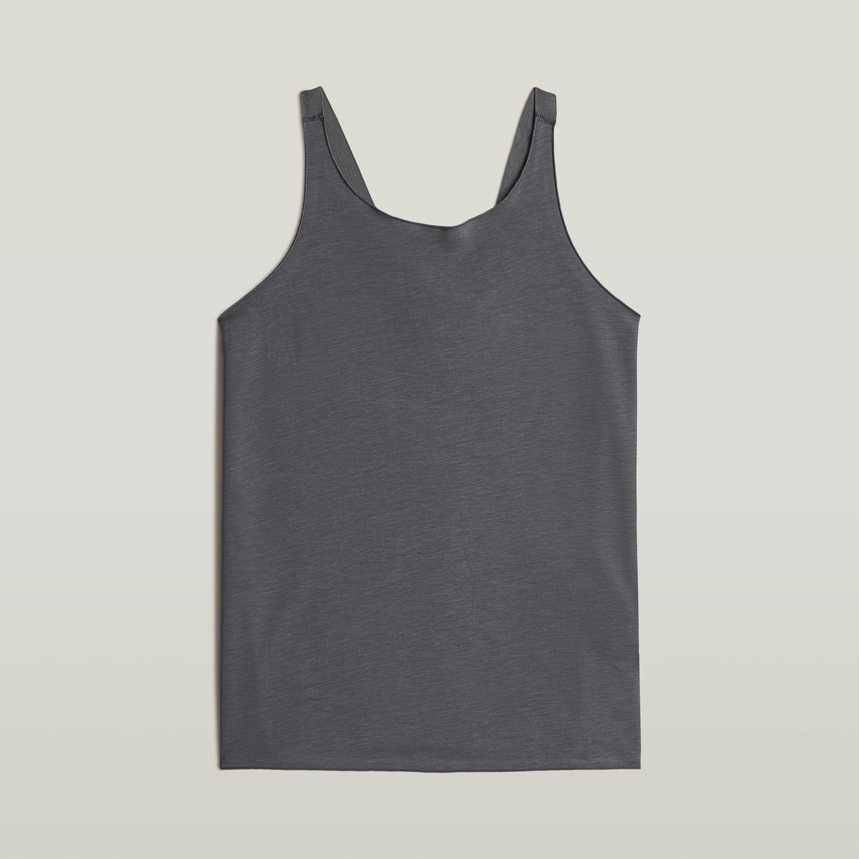 Camiseta Flowy Tape Slim La Flowy Tape Tank T-Shirt tiene fit slim con diseño racerback y escote redondo, para un look sobrio y moderno.