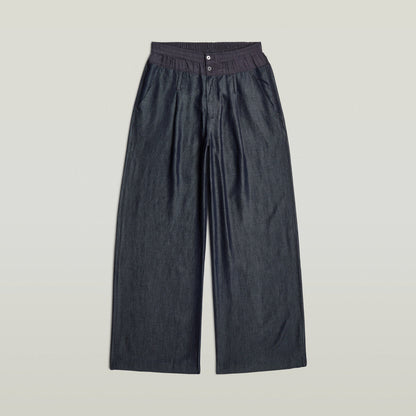 Pantalones Fluid Wide Leg ligeros en denim, diseño de talle alto y corte holgado, 100% Lyocell, color azul oscuro, pantalones fluidos de denim ligero.