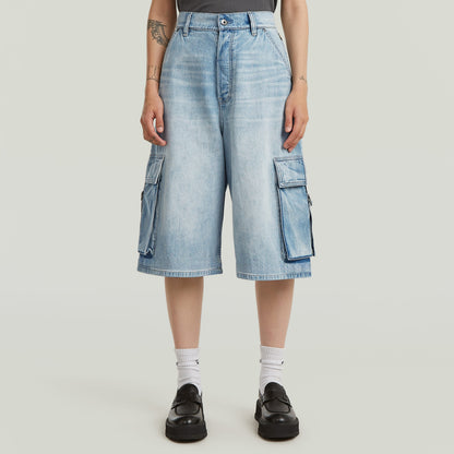 Jorts Patti Cargo con bolsillos cargo, diseño hasta la rodilla, en color azul intermedio, 100% algodón.