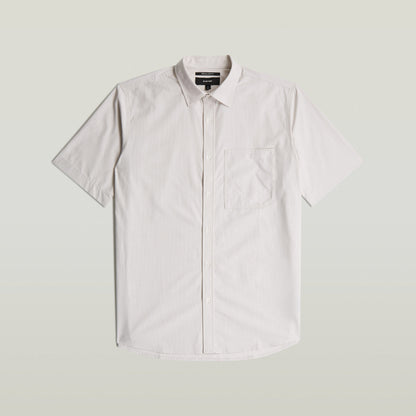 Camisa One Pocket Regular, 100% algodón, cuello de camisa, cierre de botones, bolsillo en el pecho, diseño atemporal.