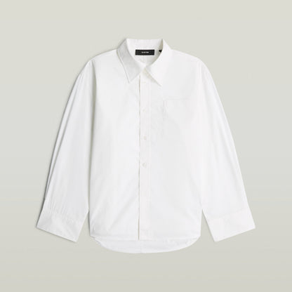 Camisa Bomber Sleeve blanca, elegante y versátil, con cuello de camisa y manga larga, hecha de algodón ecológico.