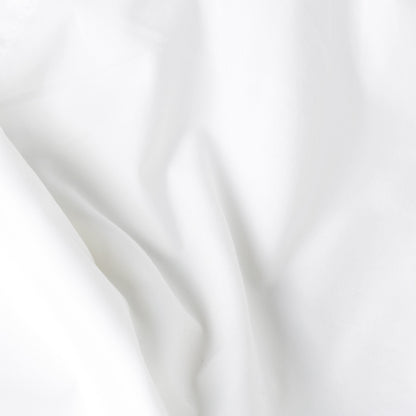 White fabric texture of the white bomber shirt, showcasing its premium material quality and elegance.