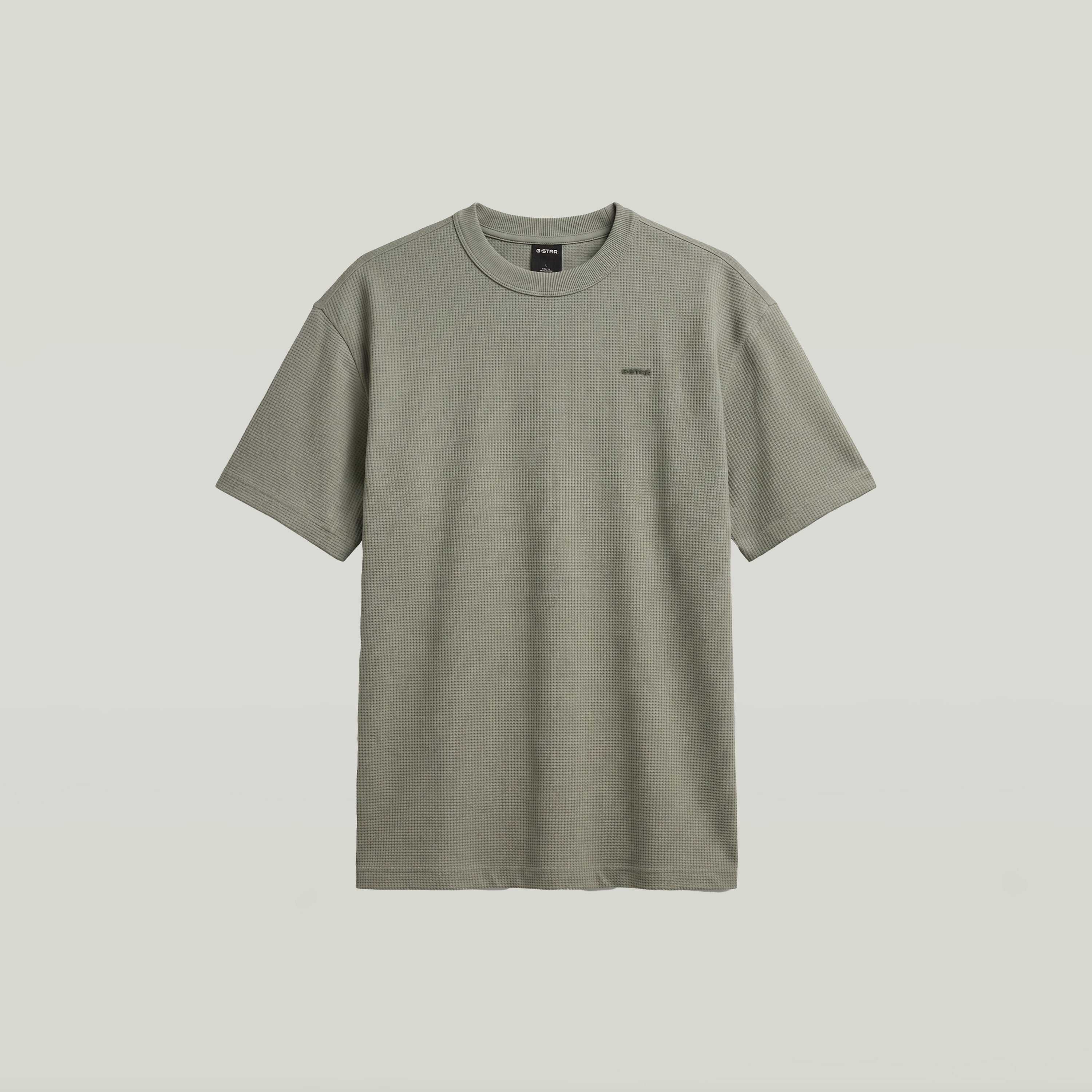 Camiseta Relaxed con textura en color verde, diseño gráfico y corte cómodo, verde textured relaxed t-shirt.