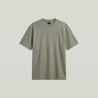 Camiseta Relaxed con textura en color verde, diseño gráfico y corte cómodo, verde textured relaxed t-shirt.