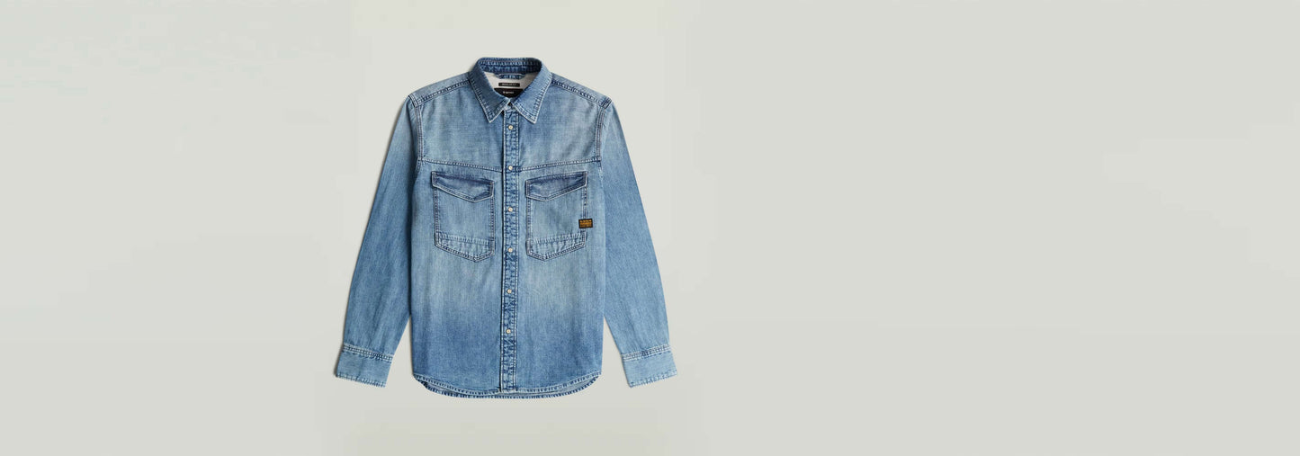 Camisa Dakota Regular de denim con corte recto, bolsillos en el pecho y bajo redondeado, 100% algodón regenerativo.