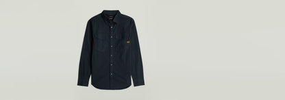 Camisa Dakota Slim en color negro, elegante y moderna, con cuello clásico y cierre de botones a presión.
