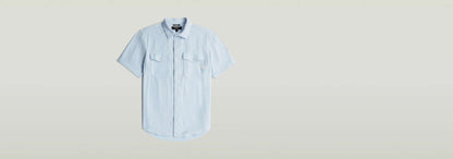 Camisa Marine Slim de corte ajustado y bajo redondeado, con bolsillos en el pecho y ligera mezcla de algodón.