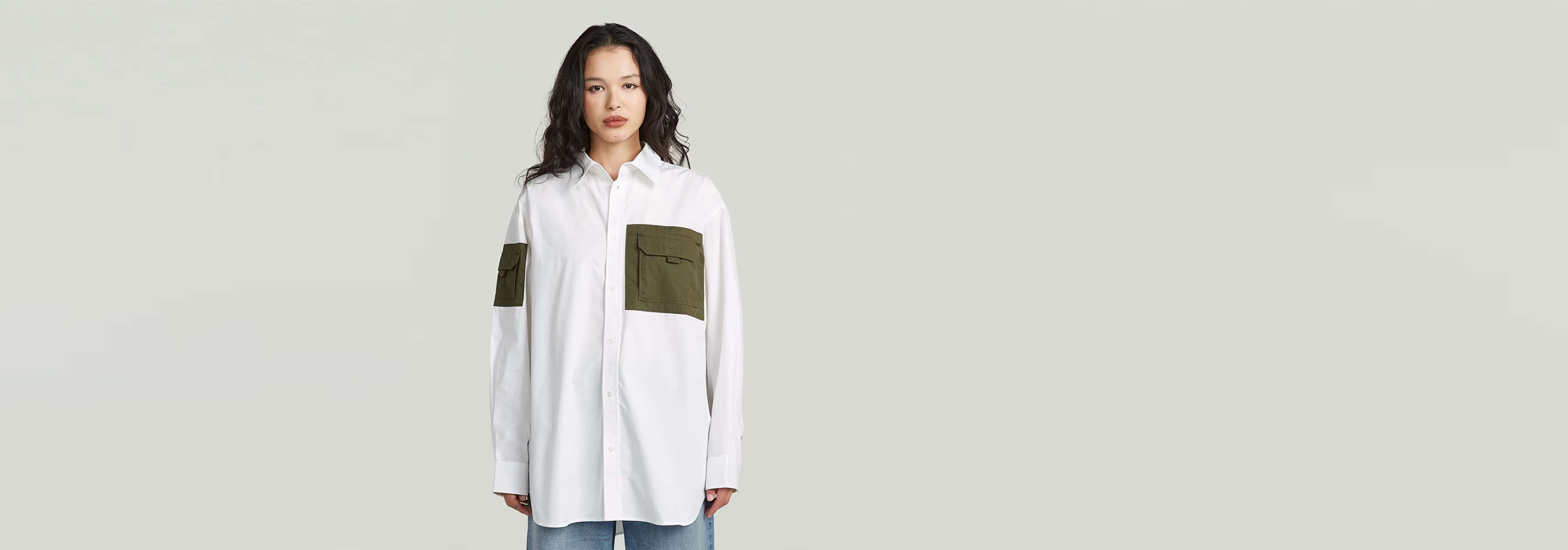 Camisa Multipocket de manga larga en color blanco con bolsillos verdes y corte holgado
