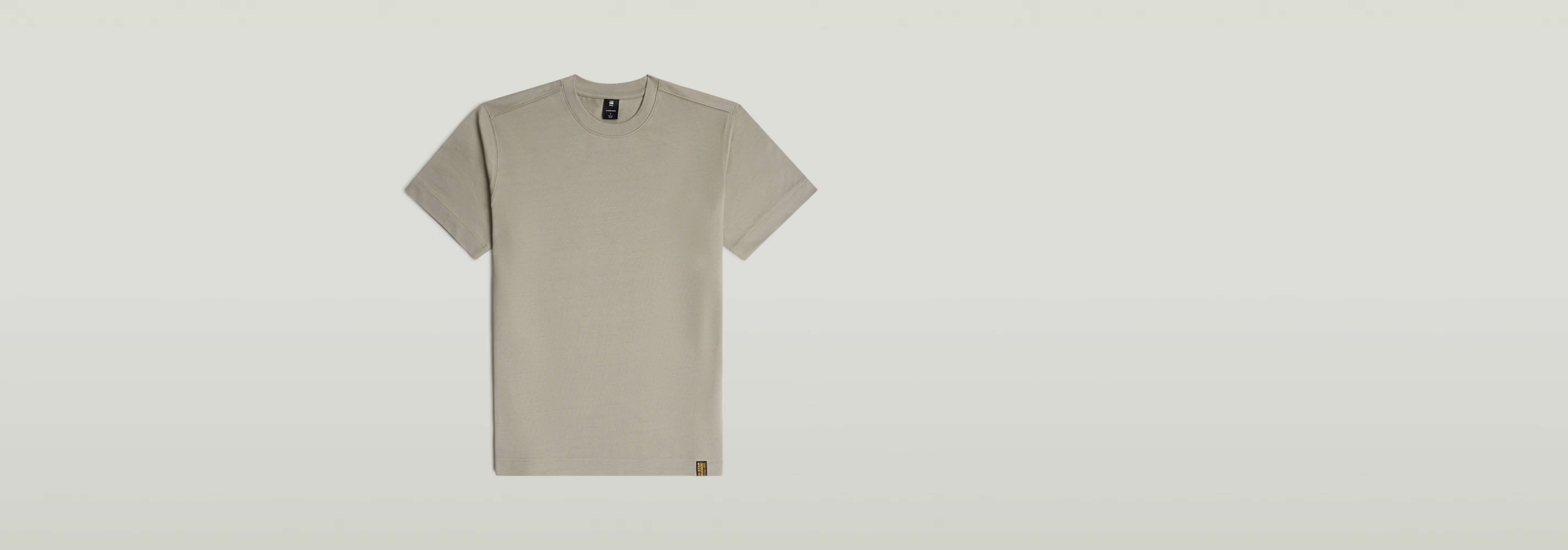 Camiseta GS-01 de algodón ecológico, corte regular, cuello redondo y manga corta en color beige.