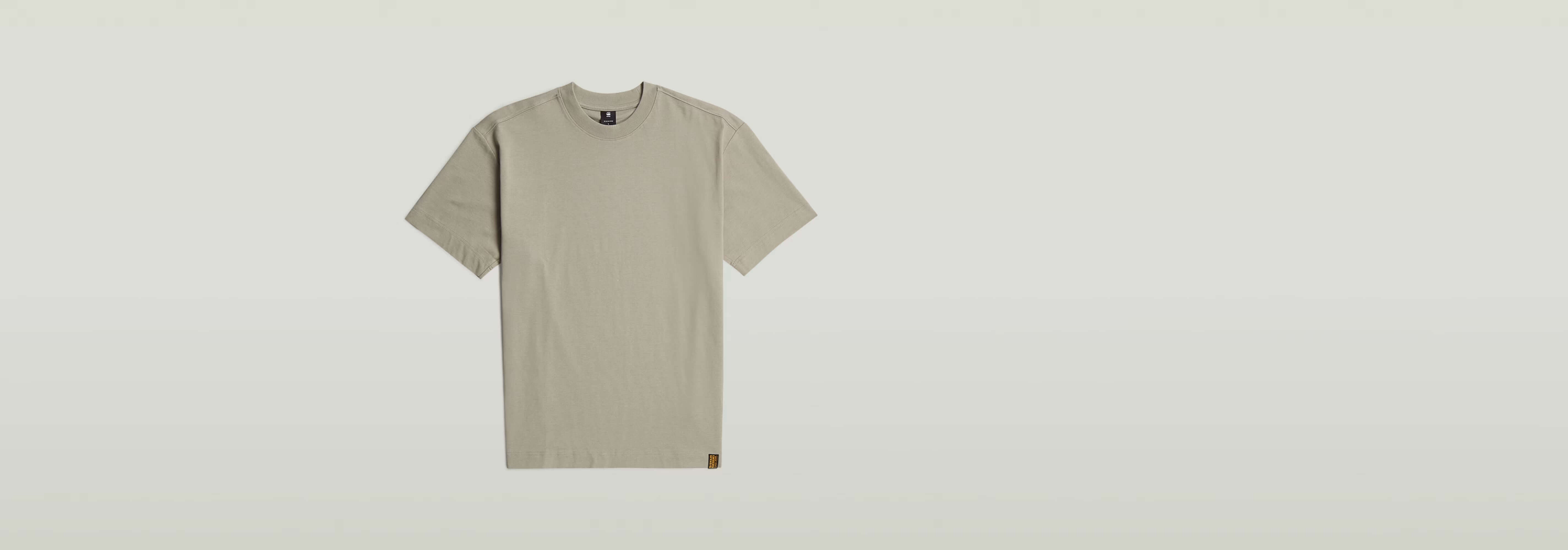 Camiseta GS-01 Relaxed de color gris claro con corte relajado y cuello redondo, 100% algodón ecológico.
