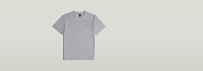 Camiseta True Regular de color gris claro con cuello redondo y manga corta, hecha de 100% algodón ecológico.