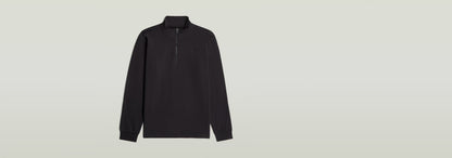 Camiseta Tweeter Half Zip Long Sleeve de manga larga con cuello alzado y cierre de cremallera, color negro.