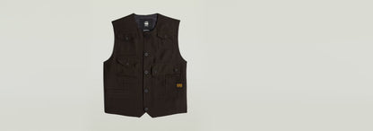 Chaleco Pocket en color negro con cierre de botones y bolsillos funcionales, diseño elegante y moderno.