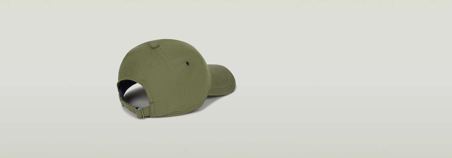 Gorra Originals Baseball con visera curvada y tira trasera ajustable, color verde.