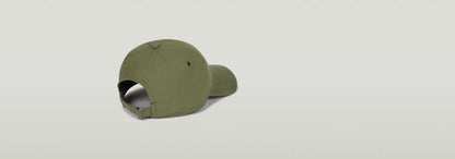 Gorra Originals Baseball con visera curvada y tira trasera ajustable, color verde.