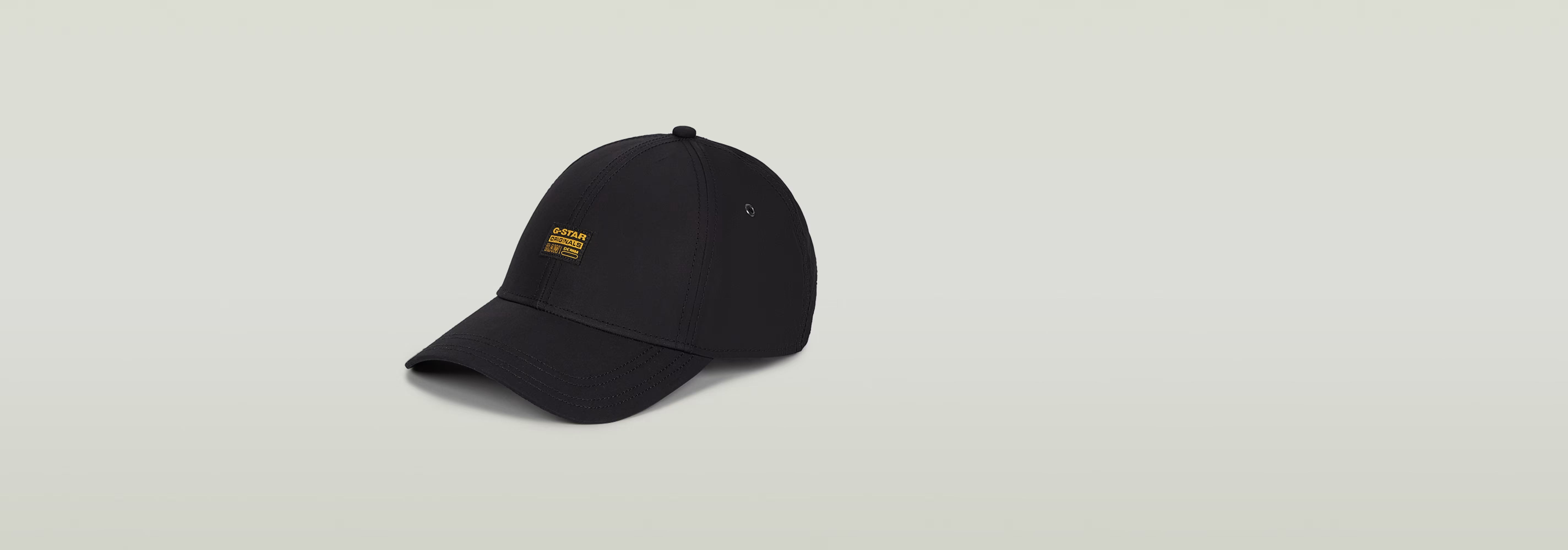 Gorra Originals Baseball negra con visera curvada y etiqueta tejida de G-STAR Originals.