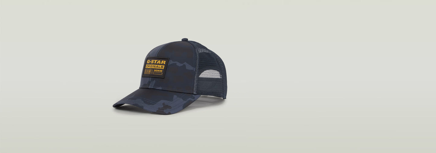 Gorra unisex Baseball Trucker con paneles de malla y etiqueta de G-Star Originals en color camuflaje.