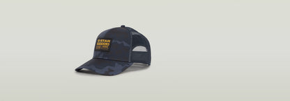 Gorra unisex Baseball Trucker con diseño cámuflaje y etiqueta G-STAR Originals en la parte delantera.