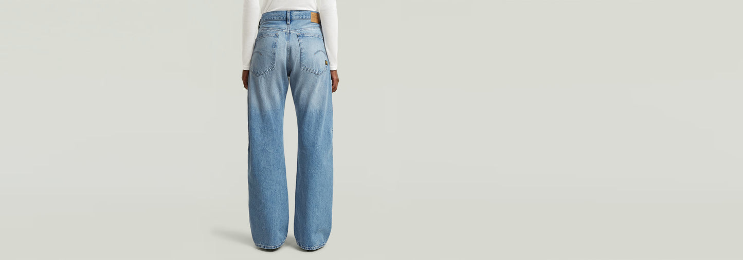 Jeans Bowey Barrel visto desde atrás, en denim de 13 onzas, con pierna holgada y bragueta de botones.