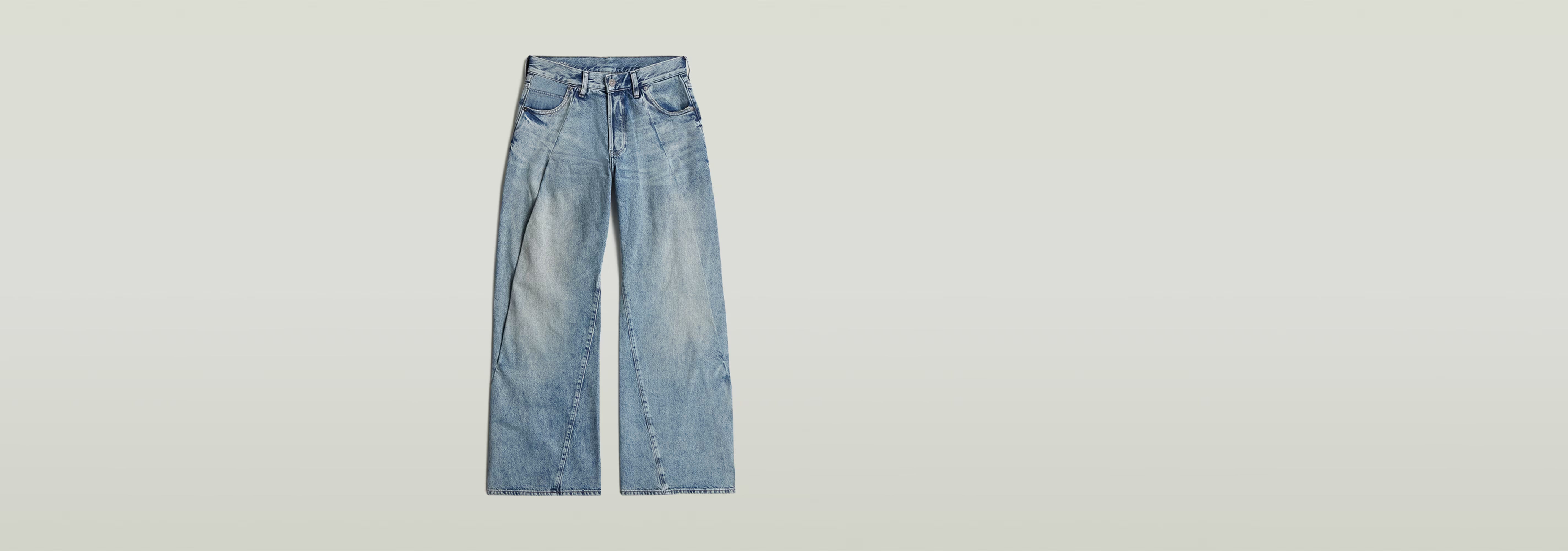 Jeans Contor Barrel Wide Pleat en corte holgado con talle bajo y pernera larga, diseño contemporáneo.