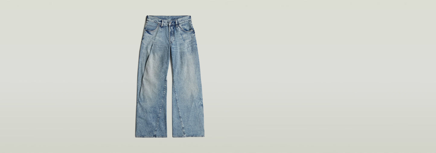 Jeans Contor Barrel Wide Pleat en corte holgado con talle bajo y pernera larga, diseño contemporáneo.