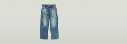 Jeans Contor Loose Carpenter en denim greencast con corte holgado y estilo de ropa de trabajo.