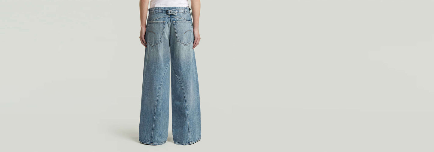 Jeans Helyx Cinch Wide vistos desde atrás, con silueta de pierna ancha y cintura de talle medio.