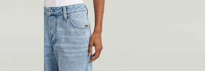 Jeans Roxx Wide con corte holgado y dobladillo vuelto, confeccionados en algodón regenerativo.