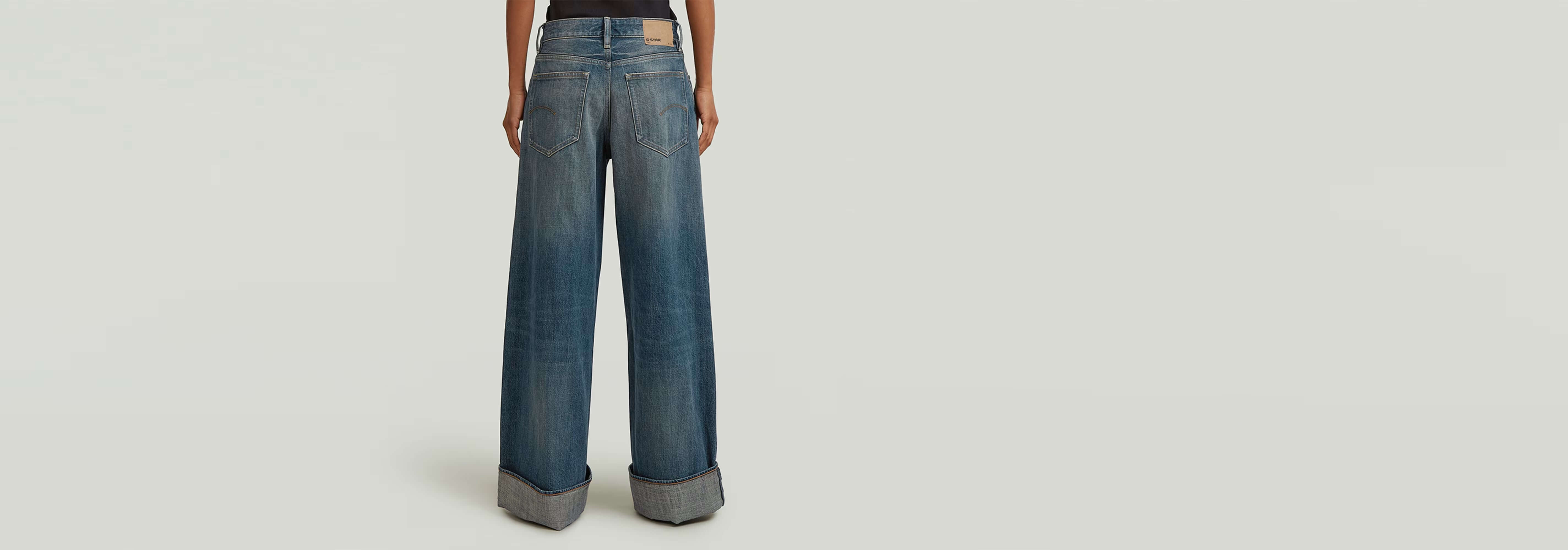 Jeans Roxx Wide en corte holgado y dobladillo vuelto, vista trasera de estilo contemporáneo.