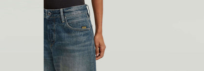 Jeans Roxx Wide en denim greencast con corte holgado y dobladillo vuelto para un estilo moderno.