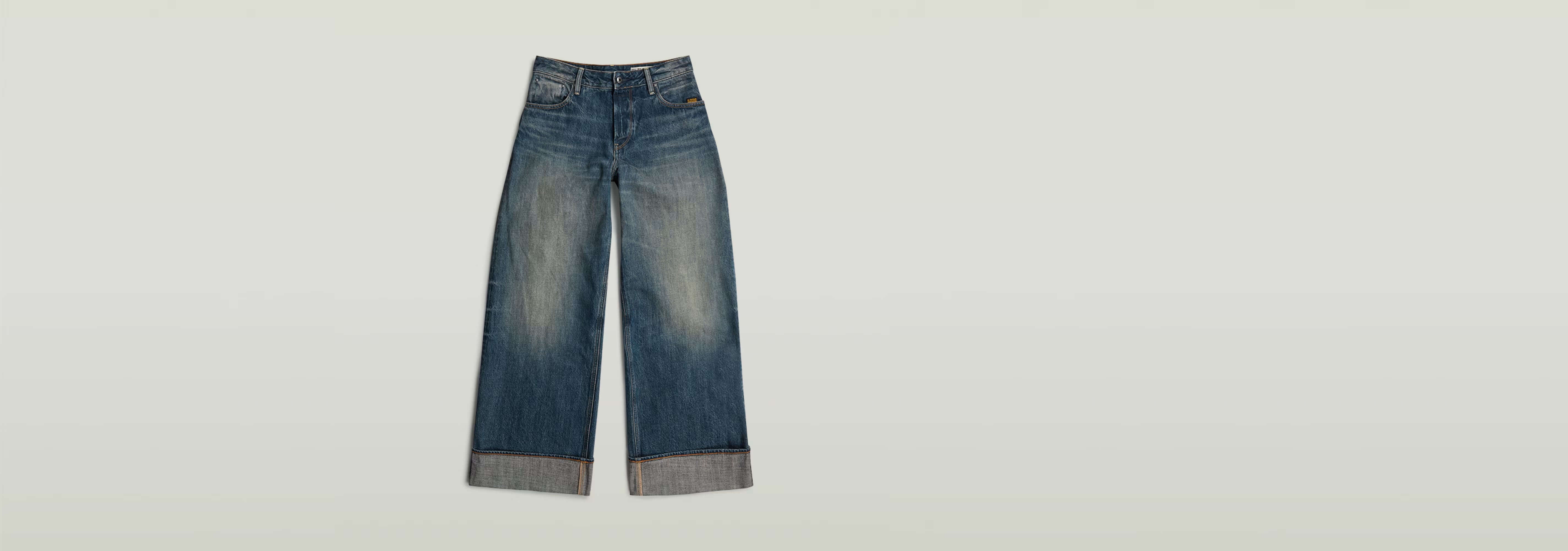 Jeans Roxx Wide con corte holgado y dobladillo vuelto, en denim greencast de tinte índigo.