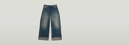 Jeans Roxx Wide con corte holgado y dobladillo vuelto, en denim greencast de tinte índigo.