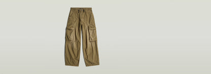 Pantalones Balloon Cargo de corte cónico con bolsillos y cierre a presión.