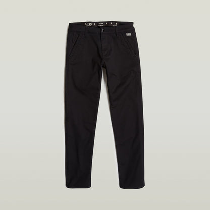 Pantalones Kate Boyfriend (Copia) en color negro, con corte relajado y detalles de diseño únicos.