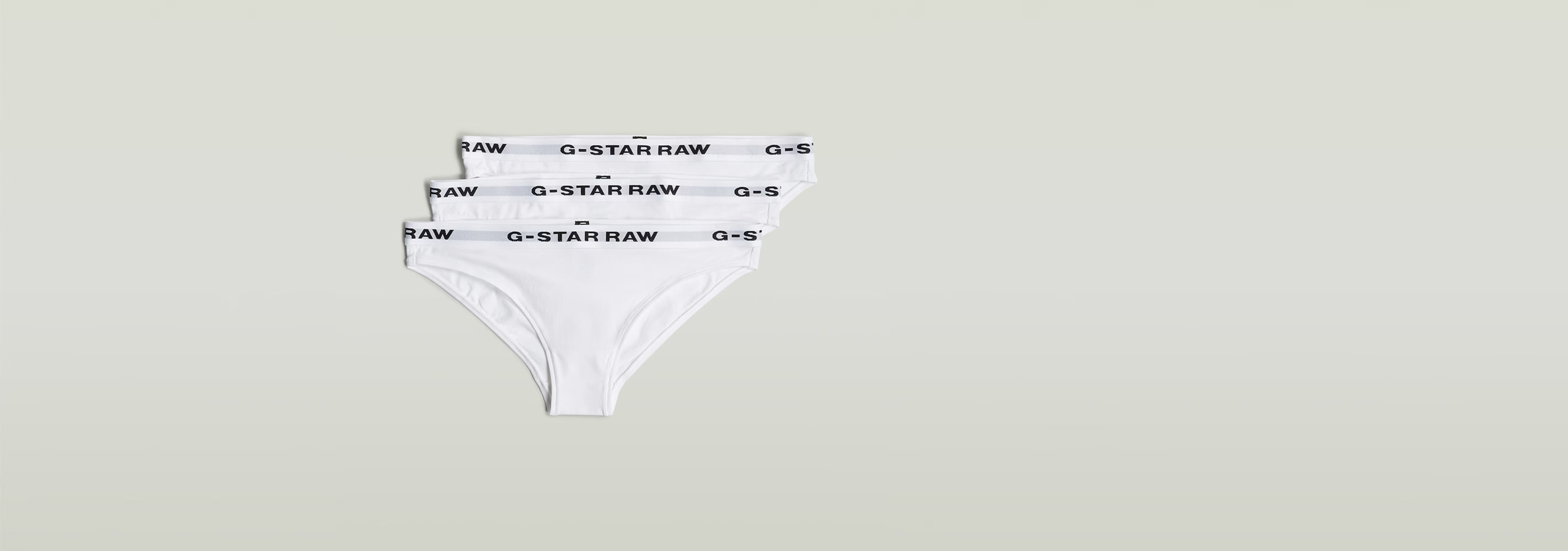 Paquete De Tres Braguitas en color blanco con logotipo G-Star RAW en la cinturilla, suaves y elásticos.
