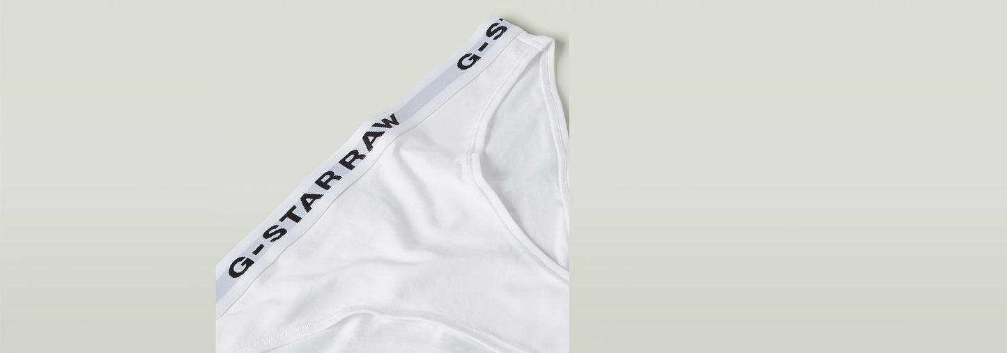Paquete De Tres Braguitas de G-Star RAW en color blanco, con cinturilla elástica y logo visible.